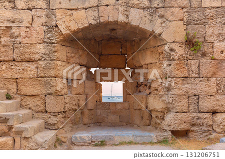 Ancient stone wall window in Rhodes Greece Ancient stone wall window in Rhodes Greece 131206751