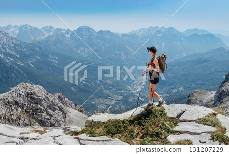 Young Woman Hiking in Albanian Alps Mountains 131207229