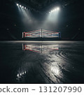 boxing ring stands alone in a dim arena highlighted by bright overhead lights. The floor reflects the colors of the ropes creating a striking visual atmosphere. 131207990