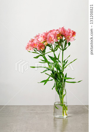 Flowers bouquet pink alstroemeria, Lily of the Incas, in vase on isolated white background Flowers bouquet pink alstroemeria, Lily of the Incas, in vase on isolated white background 131208821
