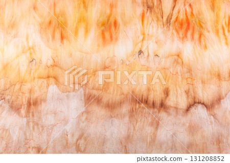 abstract pattern on silk fabric texture in yellow and brown tones abstract pattern on silk fabric texture in yellow and brown tones 131208852