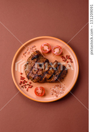 Meat, juicy beef steak grilled cooked to perfection for lunch. Barbecued steak 131209091
