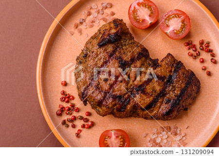 Meat, juicy beef steak grilled cooked to perfection for lunch. Barbecued steak Meat, juicy beef steak grilled cooked to perfection for lunch. Barbecued steak 131209094