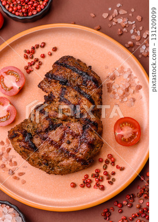 Meat, juicy beef steak grilled cooked to perfection for lunch. Barbecued steak 131209099