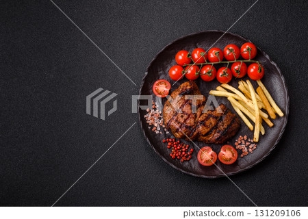 Meat, juicy beef steak grilled cooked to perfection for lunch. Barbecued steak 131209106