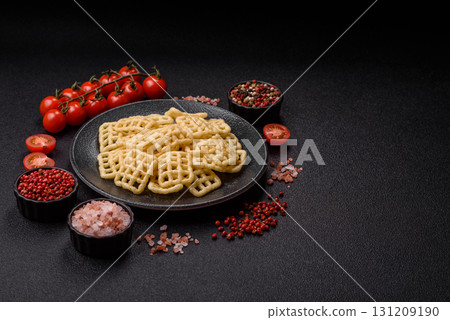 Lattice or wafer potato chips, crispy yellow snacks, takeaway food Lattice or wafer potato chips, crispy yellow snacks, takeaway food 131209190