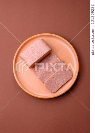 Food, meat, ham sliced in slices for the festive table. Spiced ham Food, meat, ham sliced in slices for the festive table. Spiced ham 131209228