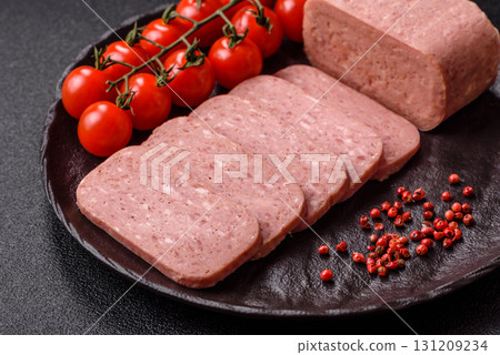 Food, meat, ham sliced in slices for the festive table. Spiced ham 131209234