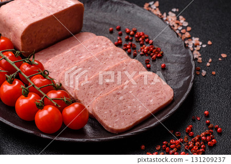 Food, meat, ham sliced in slices for the festive table. Spiced ham 131209237