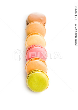 Different flavors of macarons. Colourful macaroons isolated on white background. 131209360