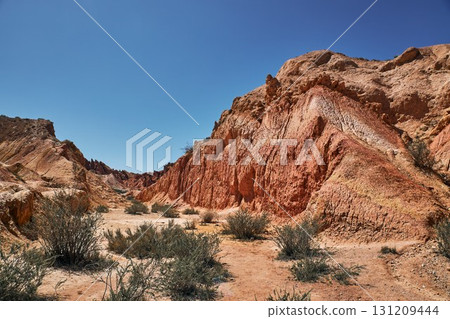 Fairy Tale Canyon, Kyrgyzstan travel destination, tourist location. Fairy Tale Canyon, Kyrgyzstan travel destination, tourist location. 131209444