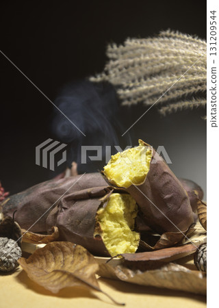 Stone-baked sweet potatoes create an autumnal image Stone-baked sweet potatoes create an autumnal image 131209544