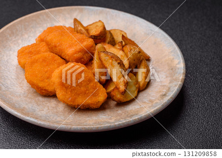 Crispy chicken nuggets, meat takeaway meal with salt. Chicken nuggets, fast food Crispy chicken nuggets, meat takeaway meal with salt. Chicken nuggets, fast food 131209858