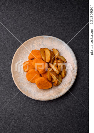 Crispy chicken nuggets, meat takeaway meal with salt. Chicken nuggets, fast food 131209864