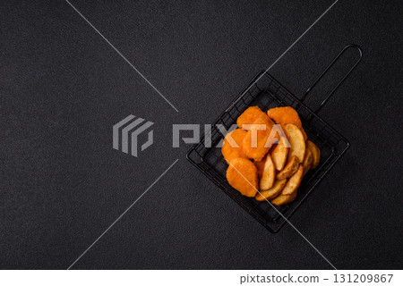 Crispy chicken nuggets, meat takeaway meal with salt. Chicken nuggets, fast food 131209867