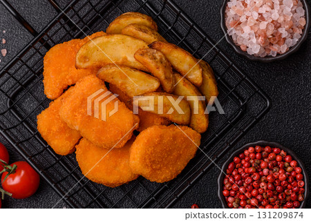 Crispy chicken nuggets, meat takeaway meal with salt. Chicken nuggets, fast food Crispy chicken nuggets, meat takeaway meal with salt. Chicken nuggets, fast food 131209874
