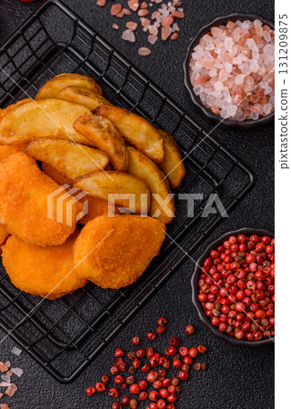 Crispy chicken nuggets, meat takeaway meal with salt. Chicken nuggets, fast food 131209875