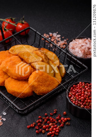 Crispy chicken nuggets, meat takeaway meal with salt. Chicken nuggets, fast food Crispy chicken nuggets, meat takeaway meal with salt. Chicken nuggets, fast food 131209876