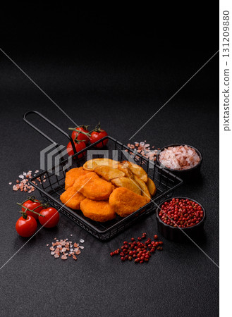 Crispy chicken nuggets, meat takeaway meal with salt. Chicken nuggets, fast food 131209880