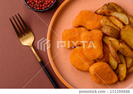 Crispy chicken nuggets, meat takeaway meal with salt. Chicken nuggets, fast food Crispy chicken nuggets, meat takeaway meal with salt. Chicken nuggets, fast food 131209886