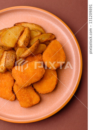 Crispy chicken nuggets, meat takeaway meal with salt. Chicken nuggets, fast food 131209891