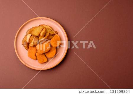 Crispy chicken nuggets, meat takeaway meal with salt. Chicken nuggets, fast food 131209894