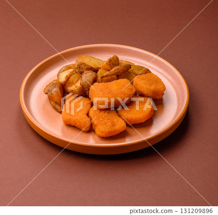 Crispy chicken nuggets, meat takeaway meal with salt. Chicken nuggets, fast food 131209896
