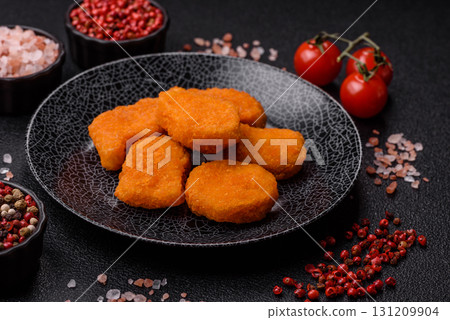 Crispy chicken nuggets, meat takeaway meal with salt. Chicken nuggets, fast food 131209904