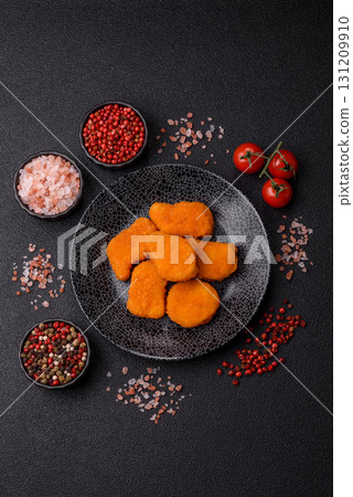 Crispy chicken nuggets, meat takeaway meal with salt. Chicken nuggets, fast food Crispy chicken nuggets, meat takeaway meal with salt. Chicken nuggets, fast food 131209910