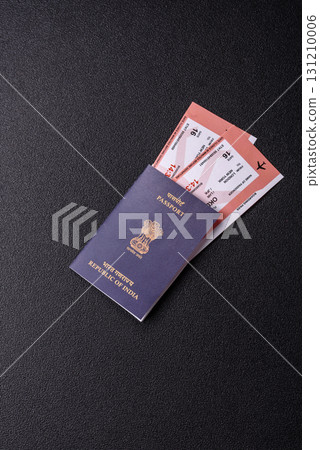 Indian passport and tickets for travelling, flying and doing business. India document, id 131210006