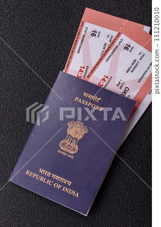 Indian passport and tickets for travelling, flying and doing business. India document, id 131210010
