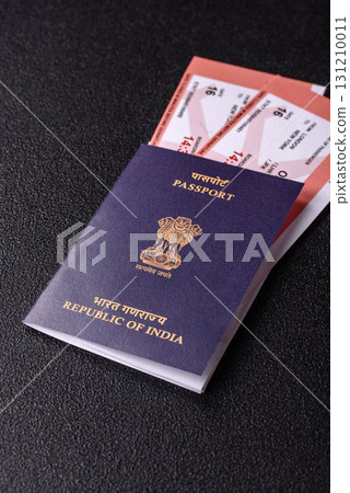 Indian passport and tickets for travelling, flying and doing business. India document, id 131210011