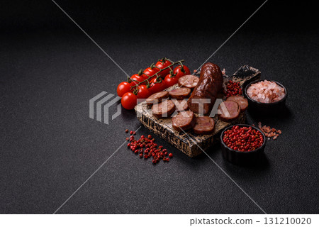 Homemade meat or vegan sausage grilled with spices. Homemade sausage cooked on barbecue 131210020