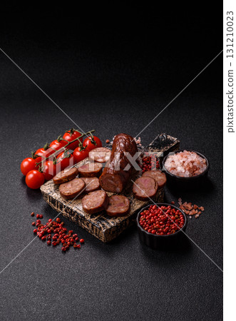 Homemade meat or vegan sausage grilled with spices. Homemade sausage cooked on barbecue Homemade meat or vegan sausage grilled with spices. Homemade sausage cooked on barbecue 131210023