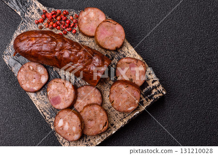 Homemade meat or vegan sausage grilled with spices. Homemade sausage cooked on barbecue Homemade meat or vegan sausage grilled with spices. Homemade sausage cooked on barbecue 131210028