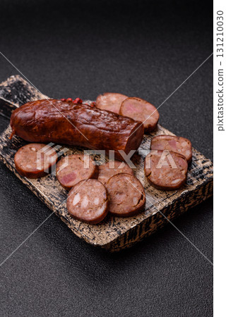 Homemade meat or vegan sausage grilled with spices. Homemade sausage cooked on barbecue Homemade meat or vegan sausage grilled with spices. Homemade sausage cooked on barbecue 131210030