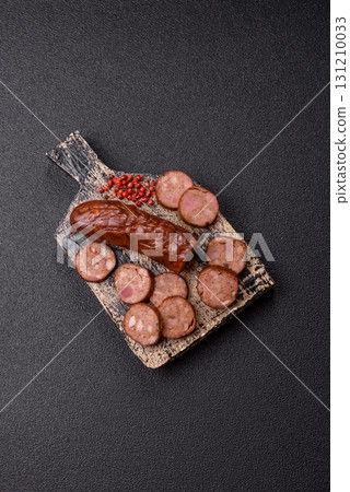 Homemade meat or vegan sausage grilled with spices. Homemade sausage cooked on barbecue Homemade meat or vegan sausage grilled with spices. Homemade sausage cooked on barbecue 131210033