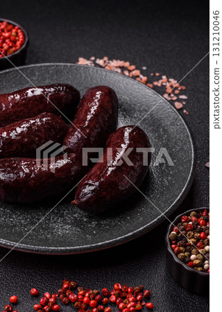 Blood sausage, pudding, meat food with lard and spices. Blood sausage Blood sausage, pudding, meat food with lard and spices. Blood sausage 131210046