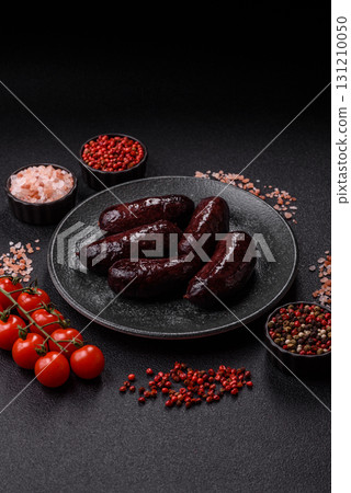 Blood sausage, pudding, meat food with lard and spices. Blood sausage Blood sausage, pudding, meat food with lard and spices. Blood sausage 131210050