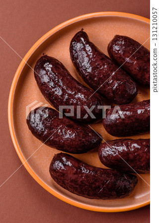 Blood sausage, pudding, meat food with lard and spices. Blood sausage 131210057