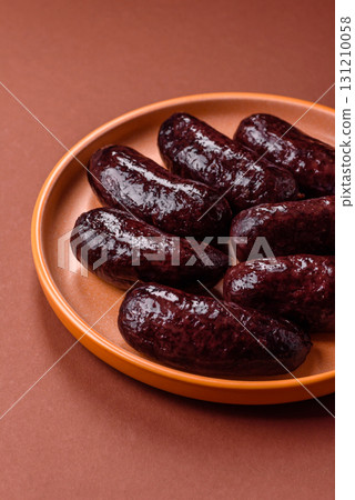 Blood sausage, pudding, meat food with lard and spices. Blood sausage 131210058
