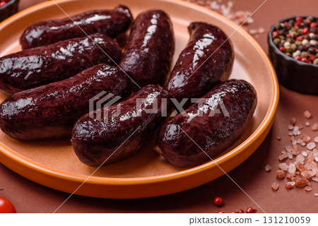 Blood sausage, pudding, meat food with lard and spices. Blood sausage Blood sausage, pudding, meat food with lard and spices. Blood sausage 131210059