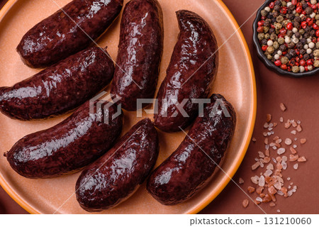 Blood sausage, pudding, meat food with lard and spices. Blood sausage Blood sausage, pudding, meat food with lard and spices. Blood sausage 131210060