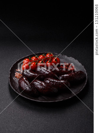 Blood sausage, pudding, meat food with lard and spices. Blood sausage Blood sausage, pudding, meat food with lard and spices. Blood sausage 131210068
