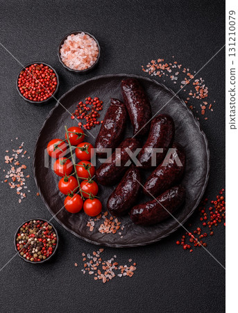Blood sausage, pudding, meat food with lard and spices. Blood sausage Blood sausage, pudding, meat food with lard and spices. Blood sausage 131210079