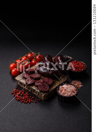 Blood sausage, pudding, meat food with lard and spices. Blood sausage 131210084
