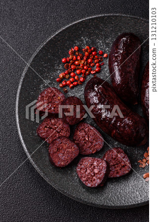 Blood sausage, pudding, meat food with lard and spices. Blood sausage Blood sausage, pudding, meat food with lard and spices. Blood sausage 131210103