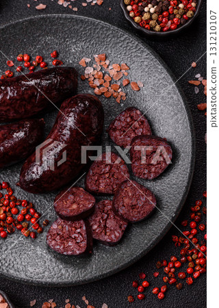 Blood sausage, pudding, meat food with lard and spices. Blood sausage Blood sausage, pudding, meat food with lard and spices. Blood sausage 131210107