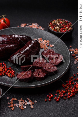 Blood sausage, pudding, meat food with lard and spices. Blood sausage Blood sausage, pudding, meat food with lard and spices. Blood sausage 131210108