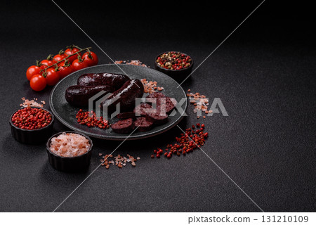 Blood sausage, pudding, meat food with lard and spices. Blood sausage Blood sausage, pudding, meat food with lard and spices. Blood sausage 131210109
